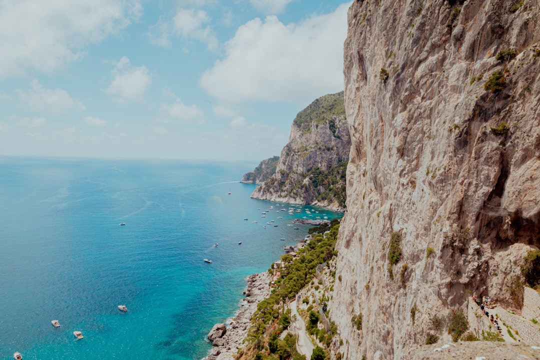 Mediterranean coastal view with sailboats