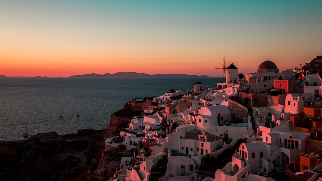 Panoramic sunset view over Santorini caldera